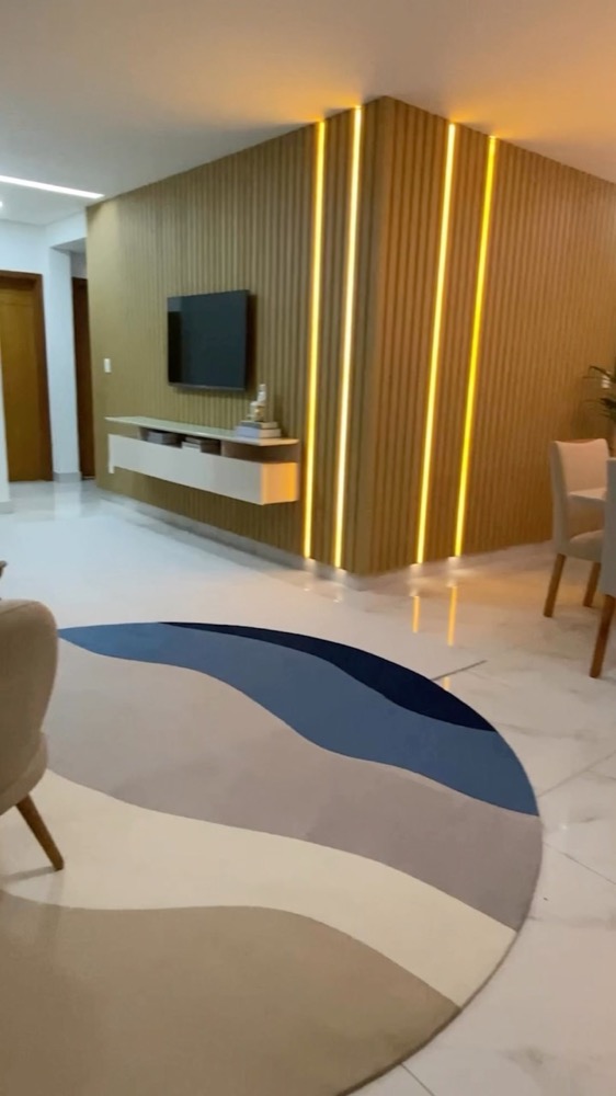 Projeto de Larissa Reis: Sala de TV e jantar de apartamento alugado